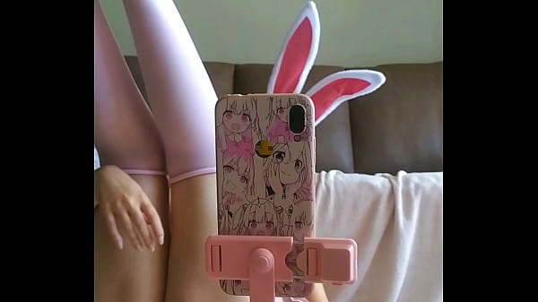 naughty student wearing a bunny outfit , tongue out, touching boobs and fingering pussy horny as fuck and kinky as hell for halloween month